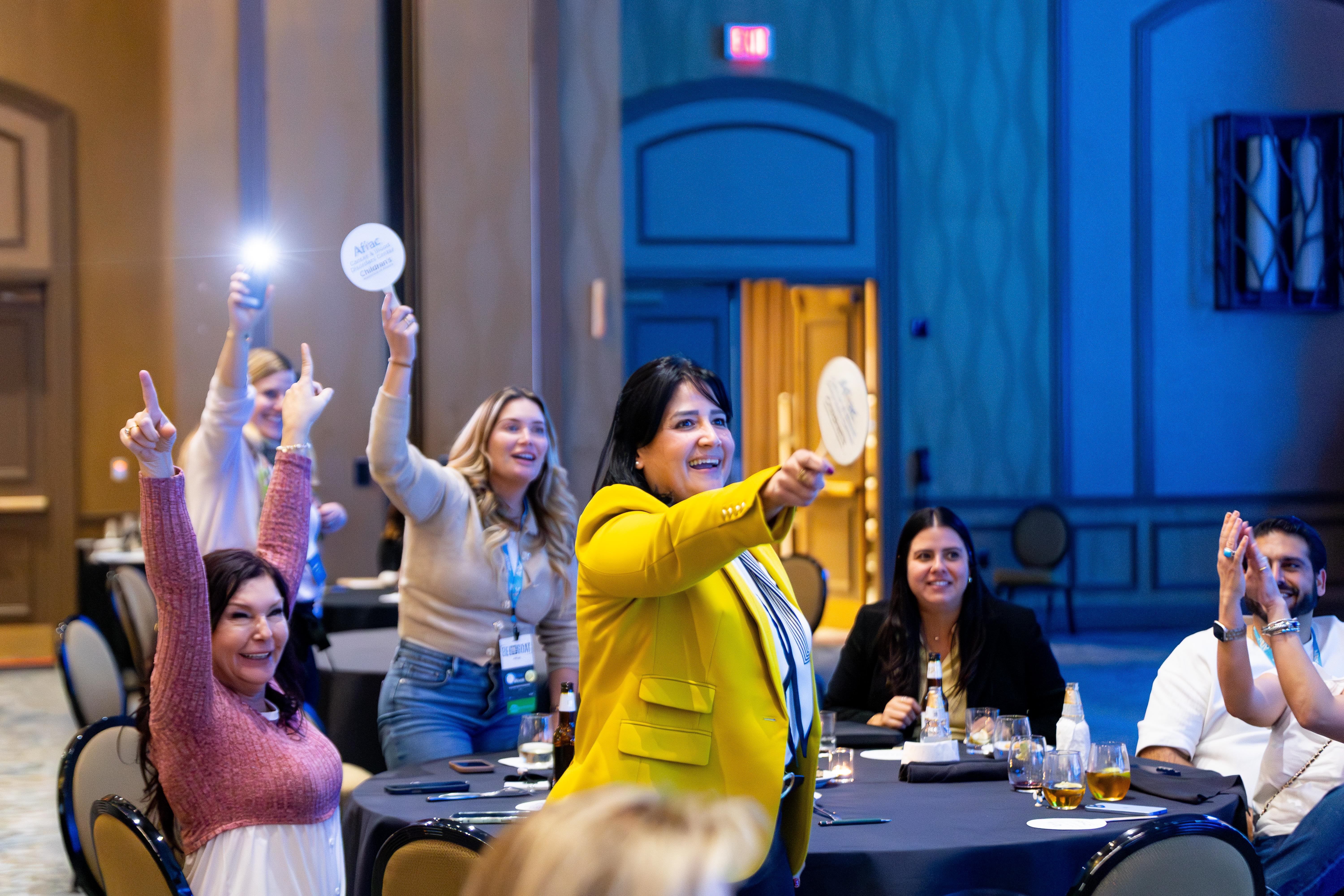 Aflac team members bidding.