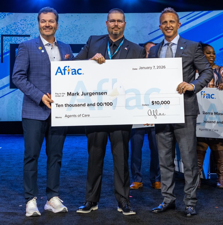  Left to right: Ken Meier; Aflac Agent Mark Jurgensen; Nate Harrison