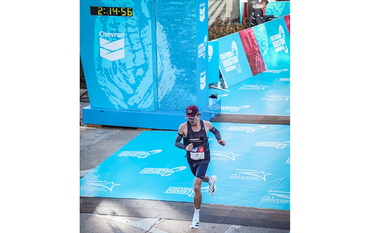 Farley crossing the Chevron Houston Marathon finish line and qualifying for the 2028 Olympic Trials.