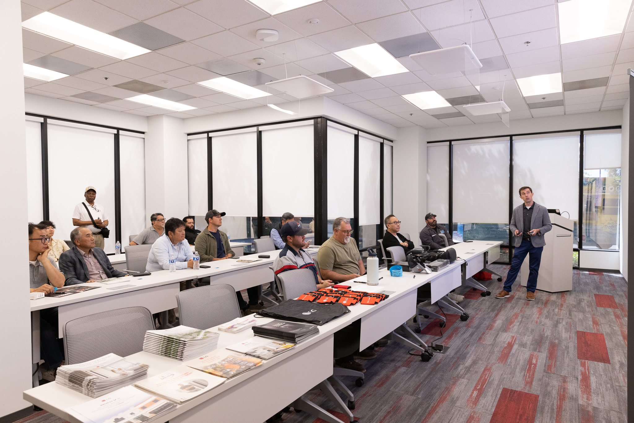 Presentation being giving to room of seated people