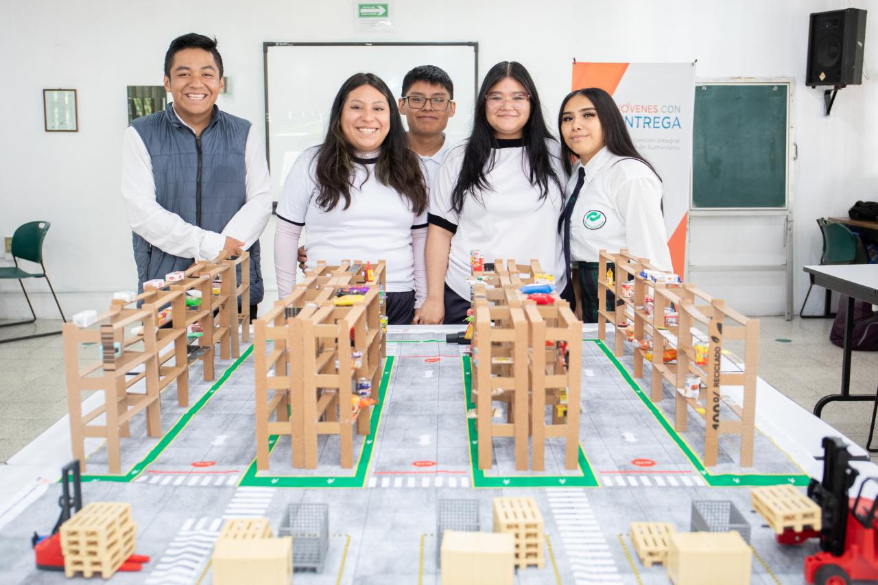 Four students showing their work