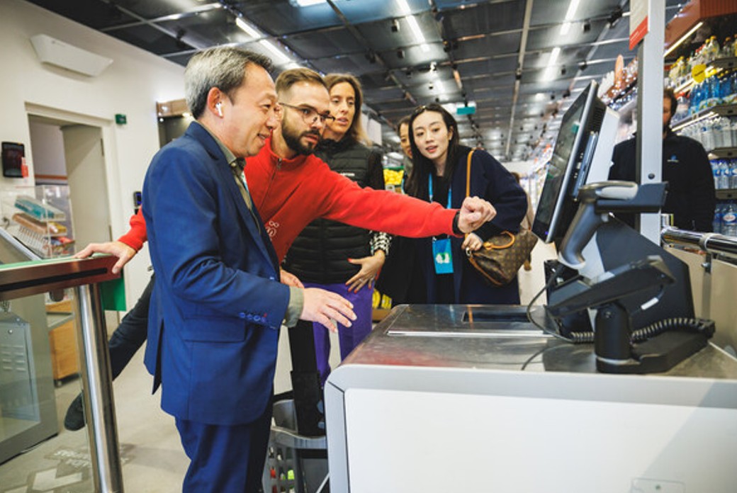 Person displaying payment processing equipment