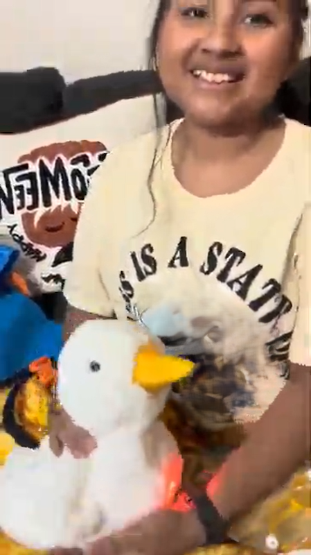 Kelly shown with her My Special Aflac Duck.