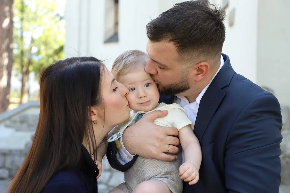 Nemanja, his wife and child.