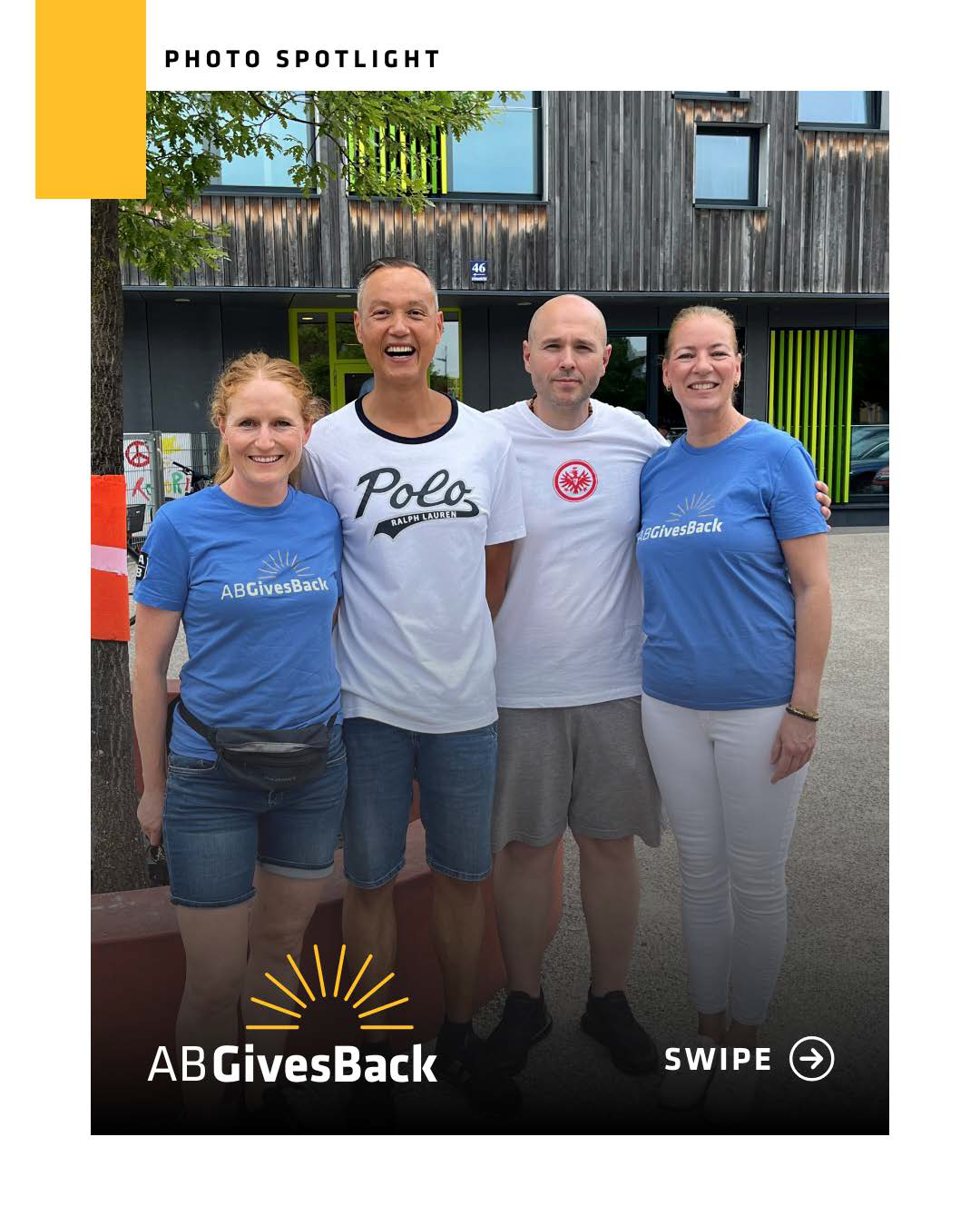 Four smiling people standing together