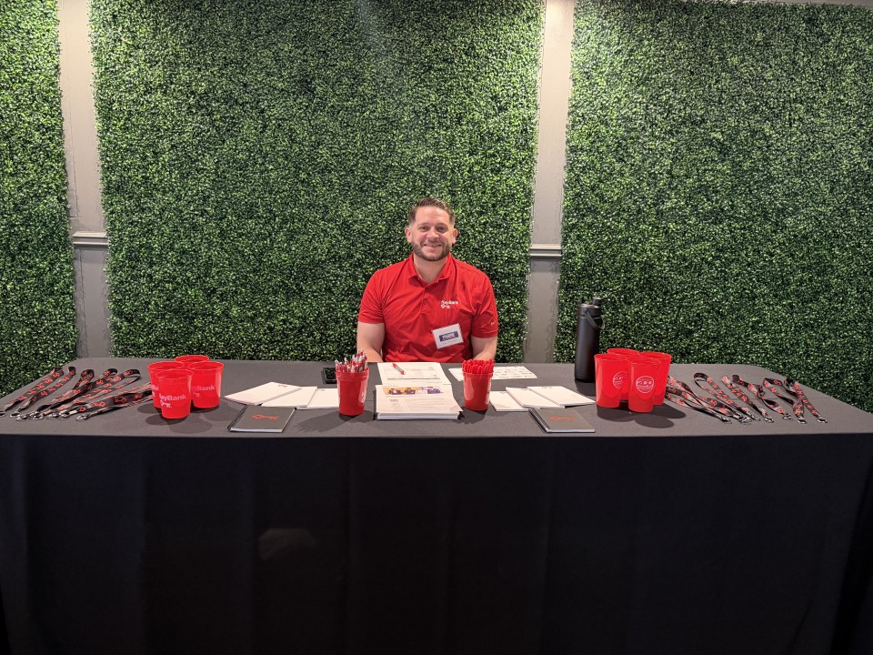 Someone sitting at a swag table