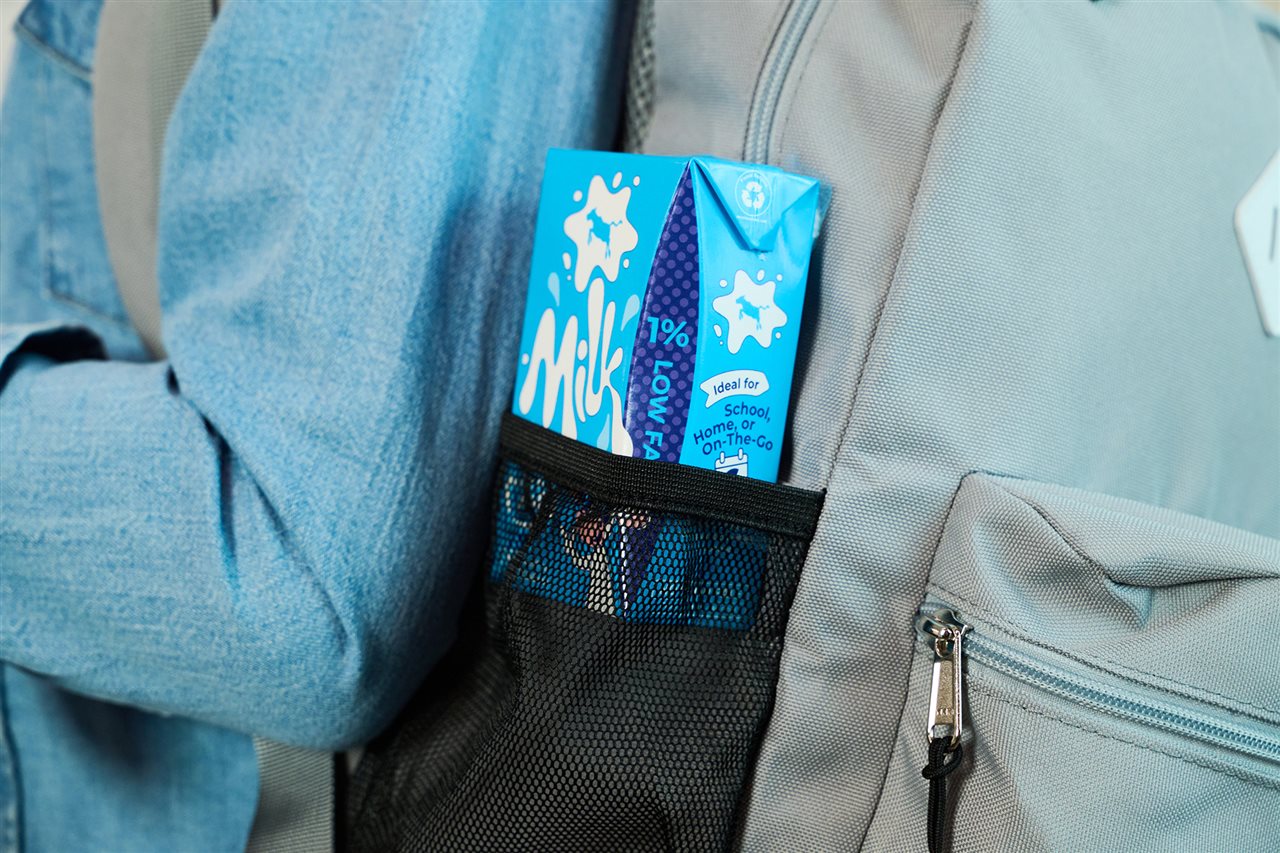 A single serving container of milk in a box