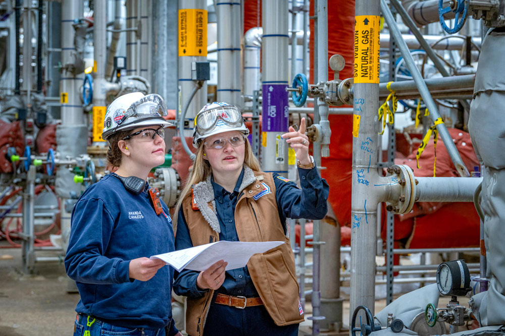 two people working together