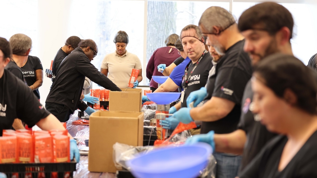 Volunteers packing food
