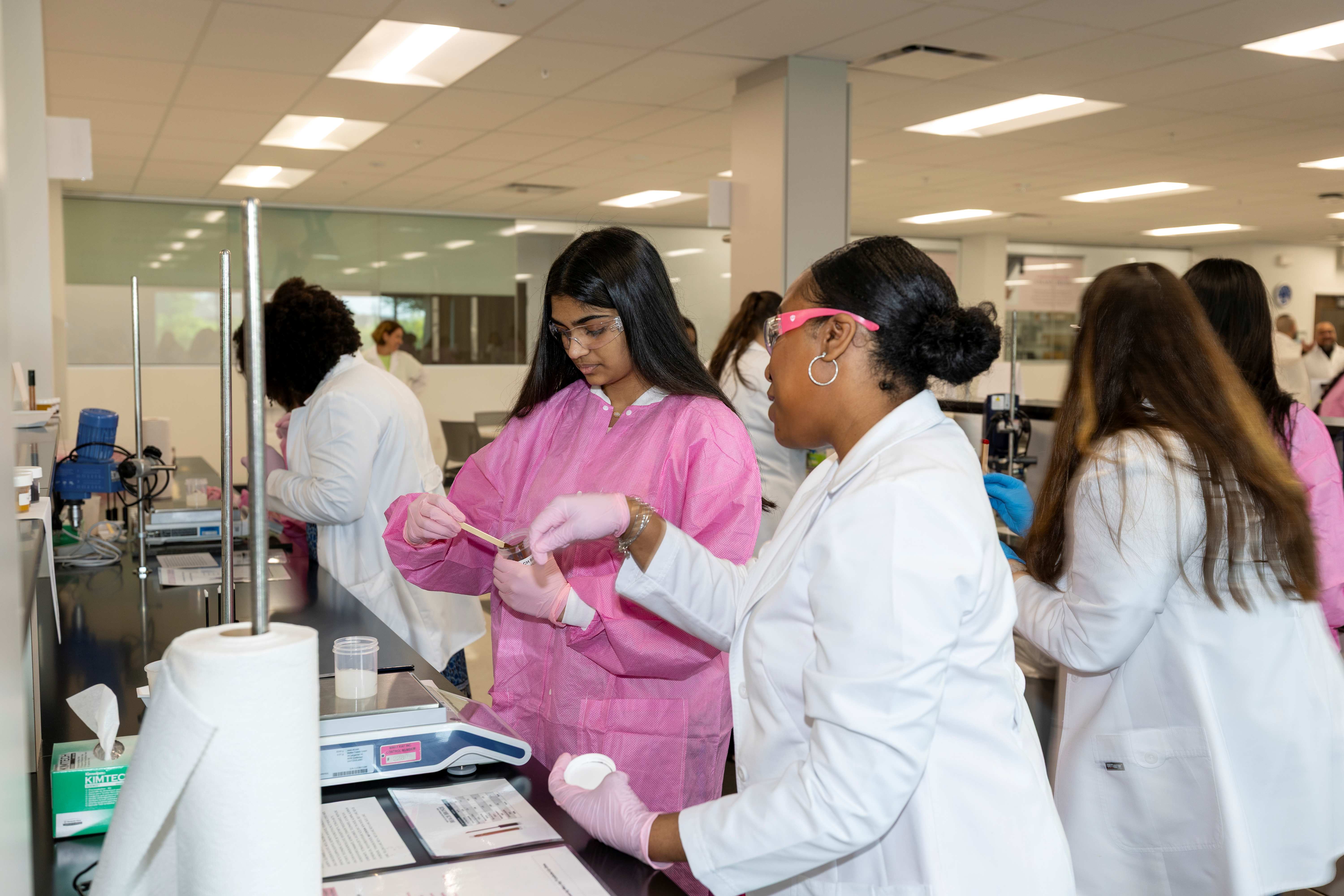 Students worked alongside Mary Kay scientists to create a unique shade of Mary Kay Unlimited® Lip Gloss. (Photo Courtesy: Bill Birt)