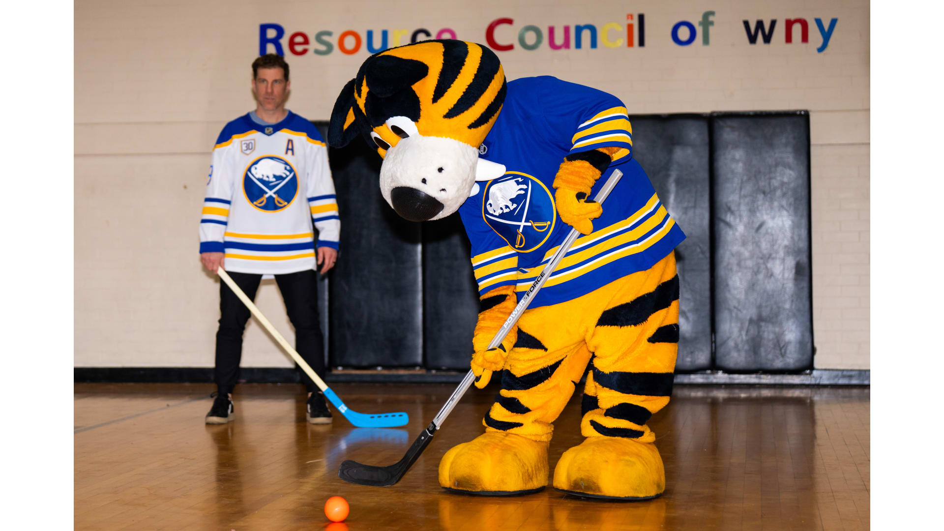 Sabres mascot playing hocket