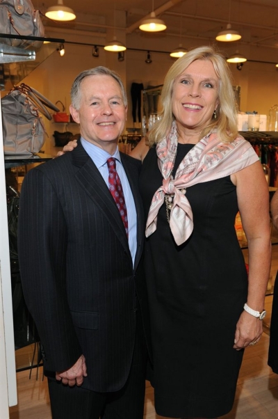 Mary Kay Inc.'s Senior Vice President of Government Relations, Michael Lunceford with Paige Flink, Executive Director for The Family Place.