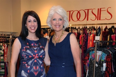 Mary Kay Inc.'s Vice President of U.S. Marketing, Sara Friedman with Jan Langbein, Executive Director for Genesis Women's Shelter.
