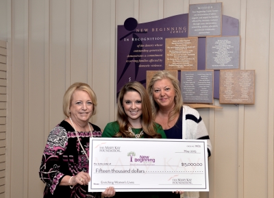 A $15,000 emergency grant from The Mary Kay Foundation provides needed relief to ensure a Dallas area women’s shelter can continue to provide safe and secure housing in the midst of major plumbing repairs. On hand to present the check was The Mary Kay Foundation board member Jessica Bair and Cindy Turek (left), chief executive officer for New Beginning Center and Collen Jamieson (right), Chief Operations Officer for New Beginning Center.