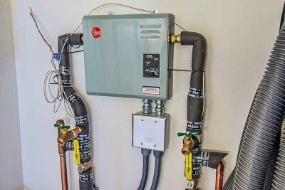 Rheem's Net-Zero Air and Water System was used for the first time at VISION House Tucson. It includes a Rheem classic 15 SEER heat pump, a hydronic air handler, and solar hot water heating system with storage tank and tankless water heater to serve as back up.