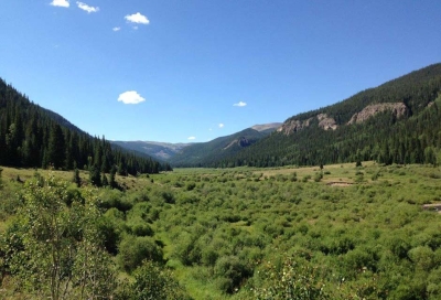 Mariposa Meadows is an 120-acre in-holding surrounded by millions of acres of National Forest land and Federal wilderness area, located near Lake City, high in the Colorado Rockies.