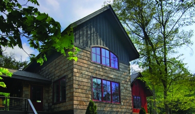 Bark Siding Shingles from Bark House are square cut; Pioneer shingles (pictured here) come with a rough bottom edge, for a more traditional, rustic look. www.barkhouse.com