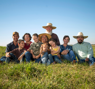 Group of farmers shown.