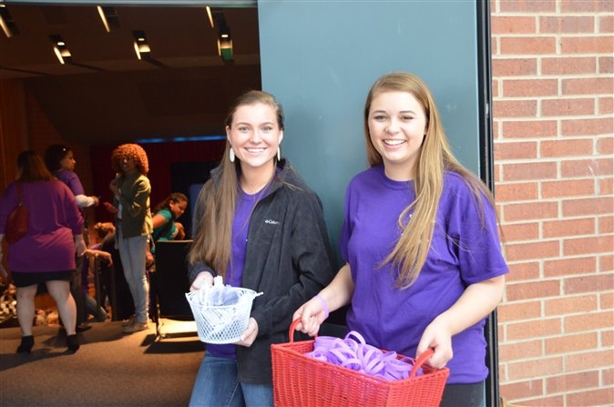 BE project students, Creekview High School’s dating abuse student organization, greeted attendees as they enetered the auditorium