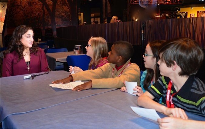 Olympic Gold Medalist and Mary Kay cause champion Jordyn Weiber speaks with young fans during “It’s Time to Talk Day” at Planet Hollywood in New York City.