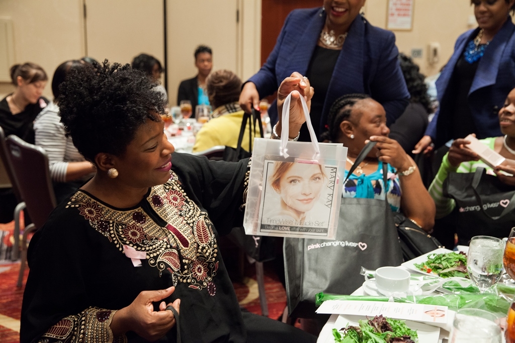 Participants at the Mary Kay Global Day of Beauty receive cosmetics and skin care products. The event delivered beauty and pampering services to survivors of domestic abuse in New York on March 5, 2015 in honor of International Women’s Day.